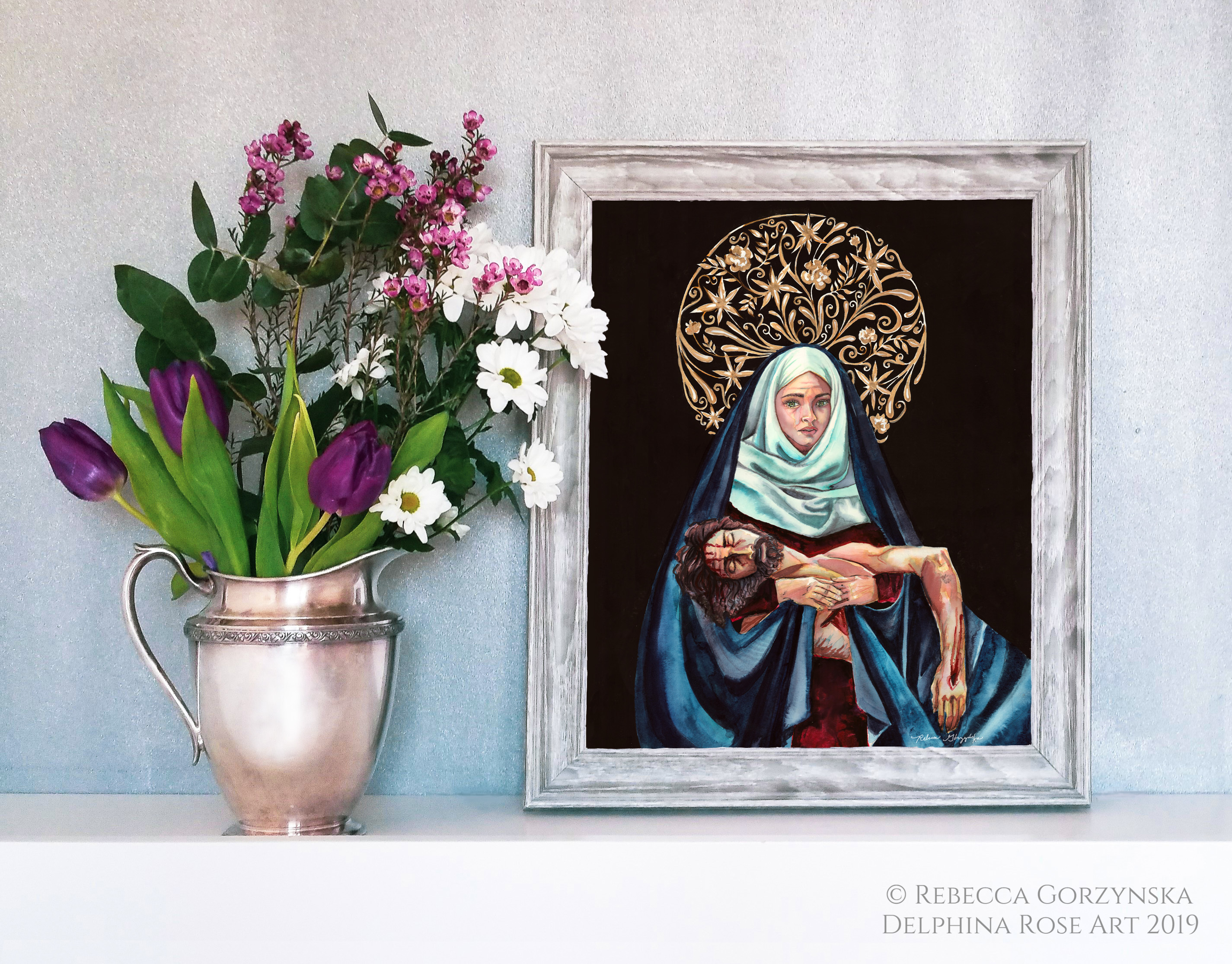pieta - Mary in white scarf and blue mantle holding dead Christ. Black background and intricate gold floral halo