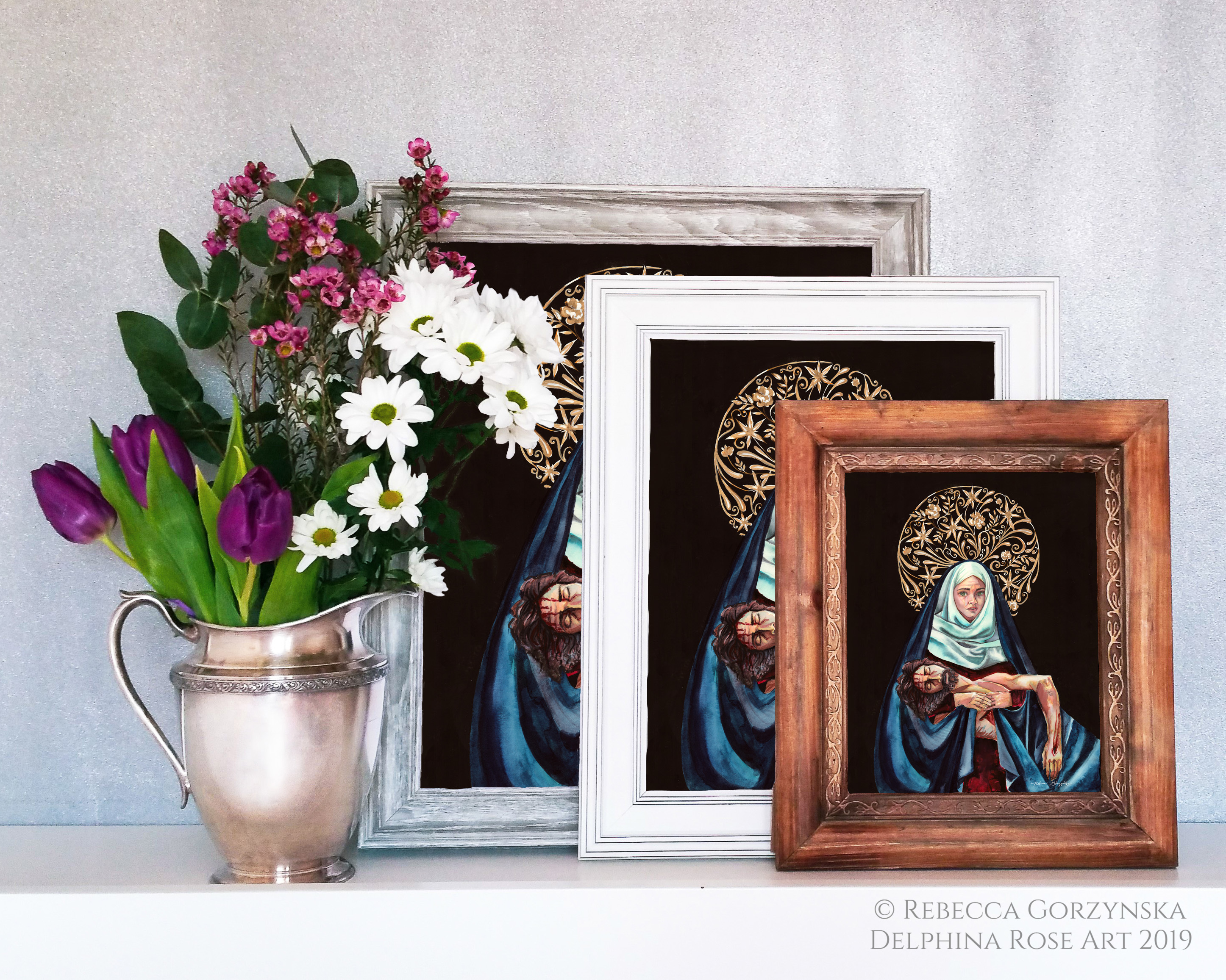 pieta - Mary in white scarf and blue mantle holding dead Christ. Black background and intricate gold floral halo