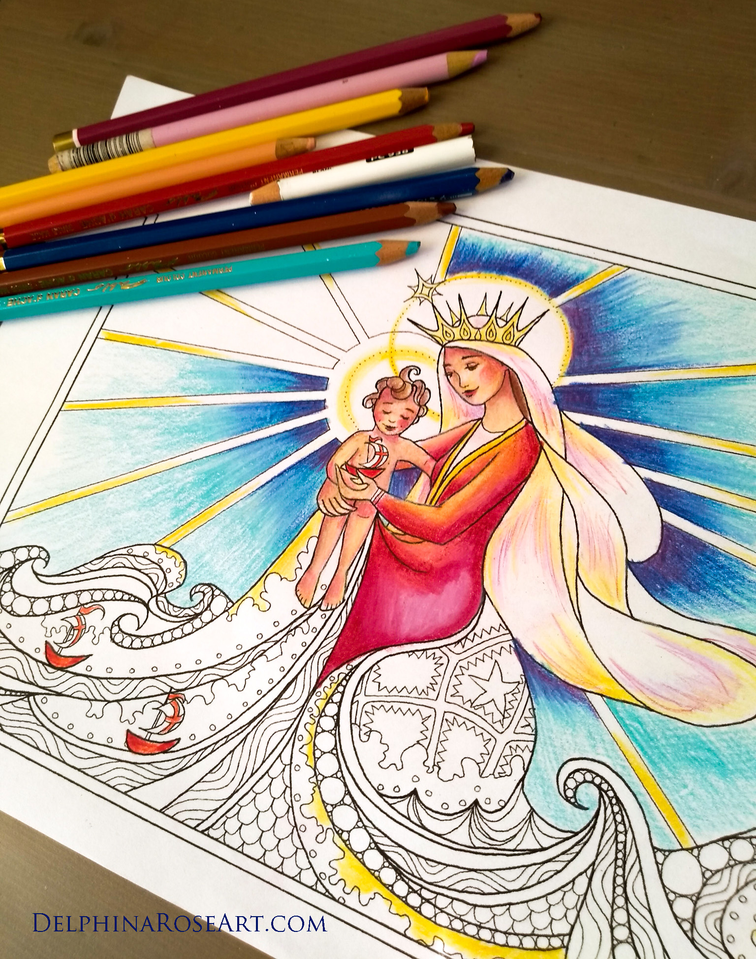 picture of coloring page of Mary as Star of the Sea and baby Jesus. Half colored with colored pencils