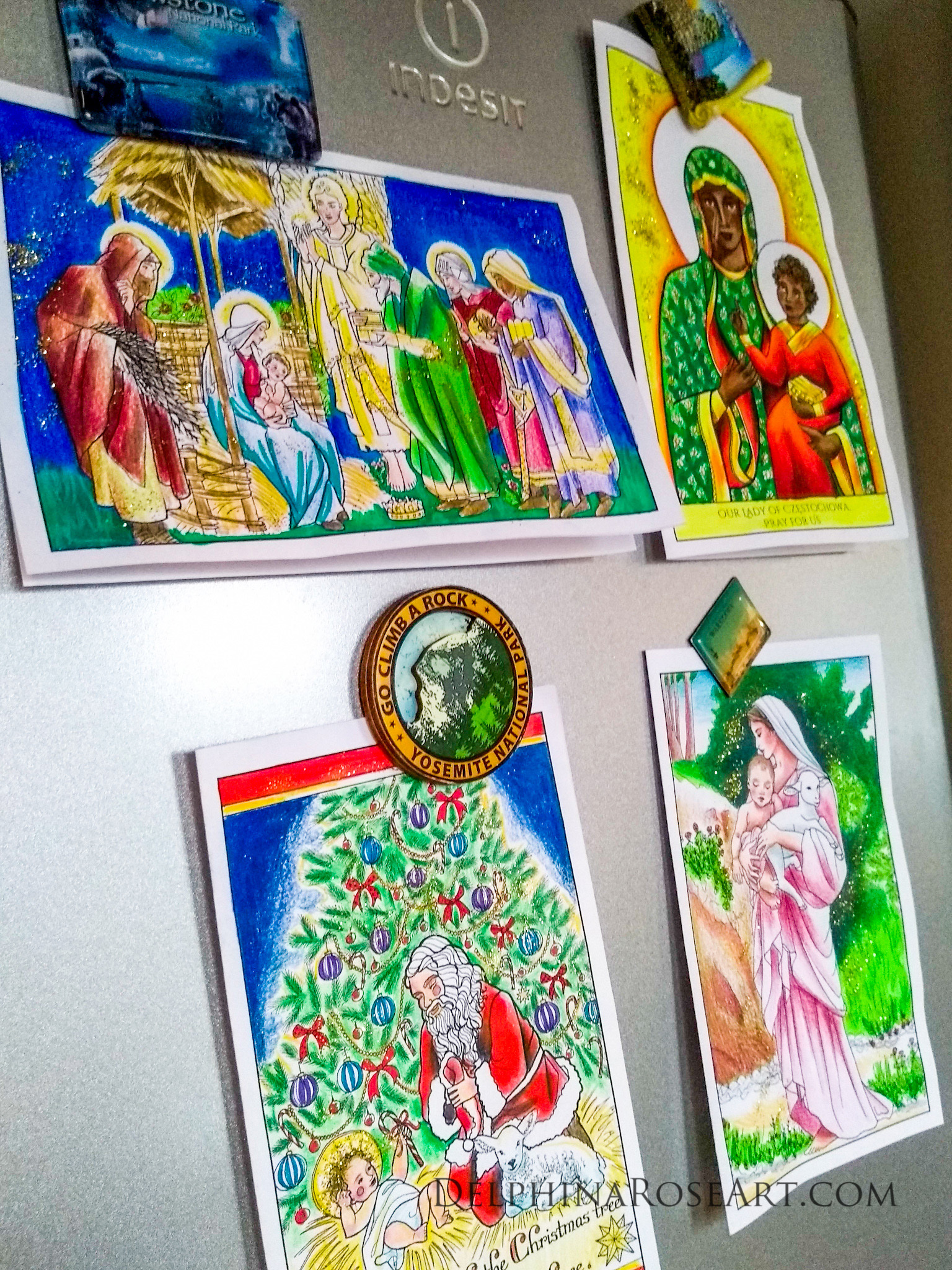 four colored Christmas coloring cards